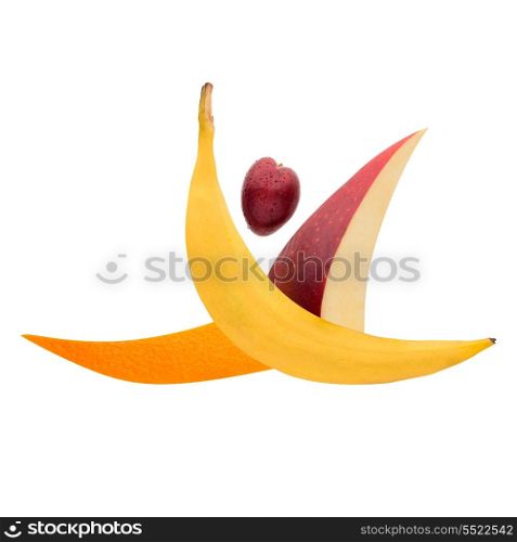 Fruits arranged in a gymnast shape jumping a split leap.