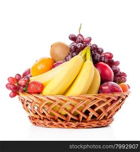 Fruits in the basket. assorted fruits in wicker basket