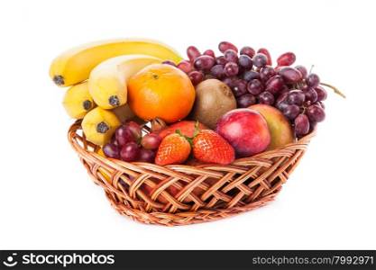 Fruits in the basket. assorted fruits in wicker basket