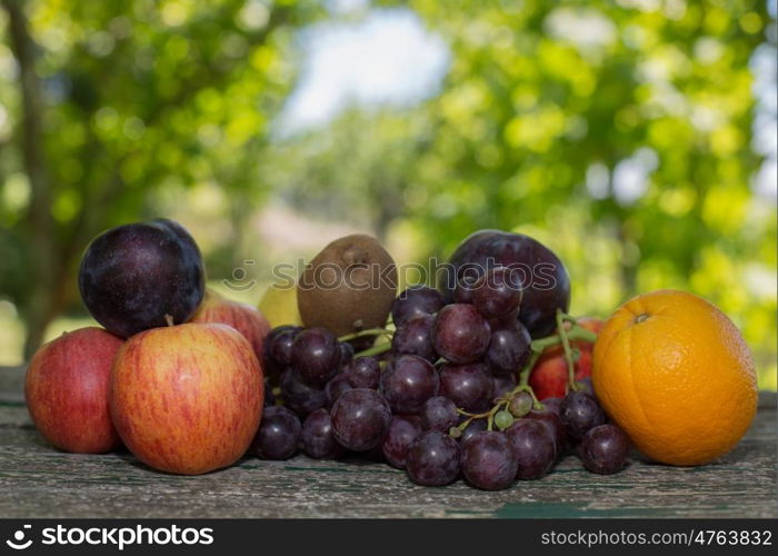 fruits in wooden table, outdoor