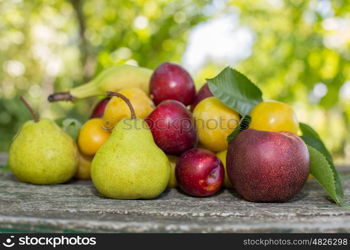 fruits in wooden table, outdoor