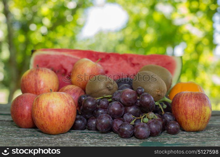 fruits in wooden table, outdoor