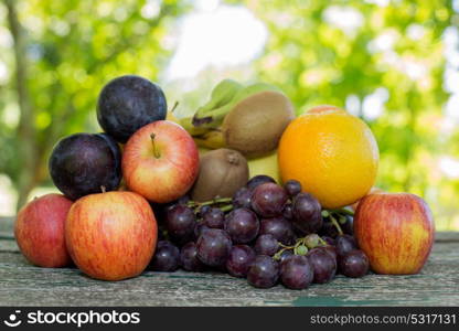 fruits in wooden table, outdoor