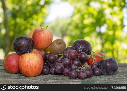 fruits in wooden table, outdoor