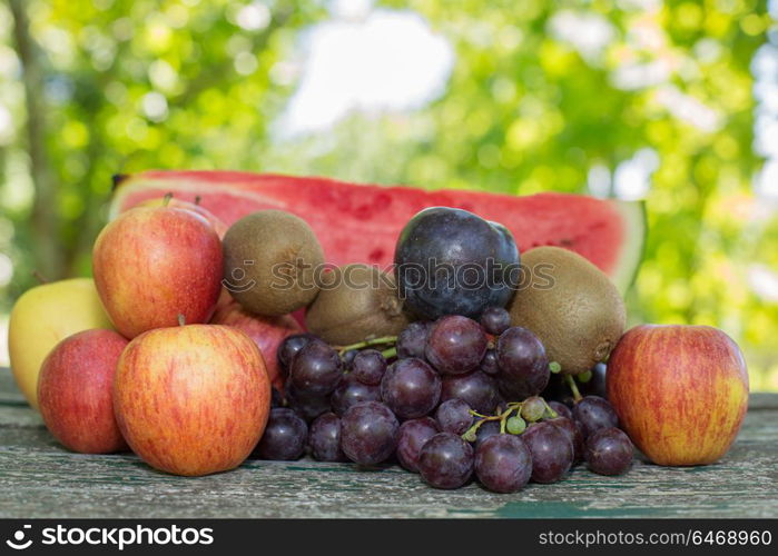 fruits in wooden table, outdoor