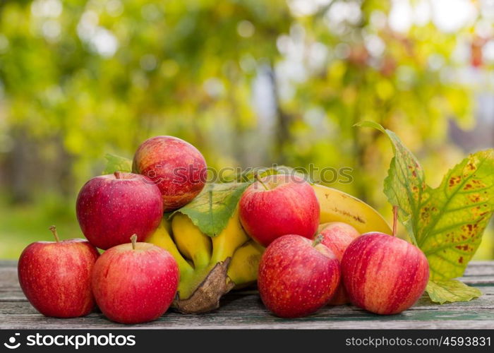 fruits in wooden table outdoor in the garden