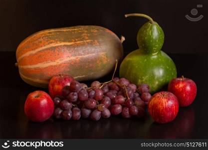 fruits on a dark background, studio picture