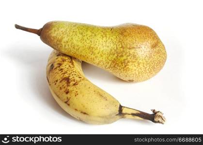 Fruits on the white background (banana and pear)