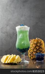 Fruity Bubble Tea in glass cup on dark background
