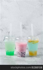 Fruity Bubble Tea in glass cup on dark background