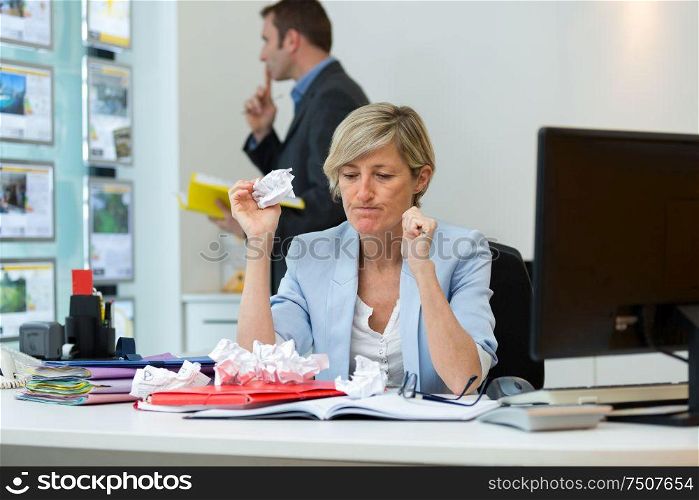frustrated businesswoman in her office