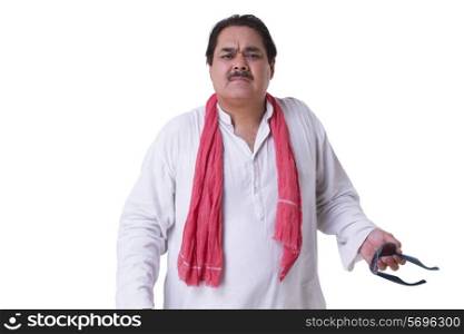 Frustrated Indian politician standing over white background
