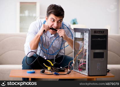 Frustrated man with broken pc computer