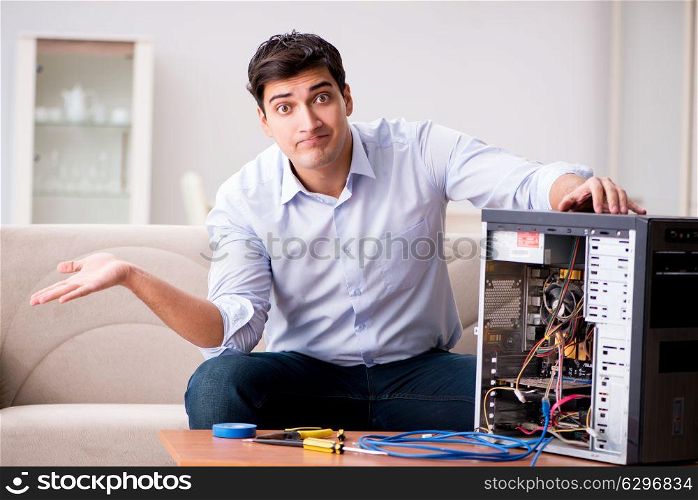 Frustrated man with broken pc computer