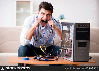 Frustrated man with broken pc computer