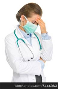 Frustrated medical doctor woman in mask