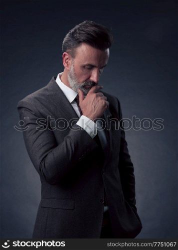 Frustrated middle aged elegant man Close up face of a stressed businessman wearing a stylish suit with eyes closed. Overworked middle eastern business man with terrible migraine. High quality photo. Frustrated middle aged elegant man Close up face of stressed businessman wearing stylish suit with eyes closed. Overworked middle eastern business man with terrible migrain