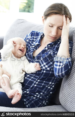 Frustrated Mother Suffering From Post Natal Depression