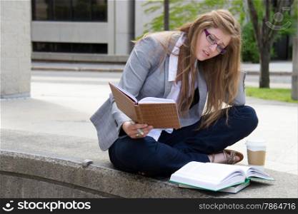 frustrated student studying on campus