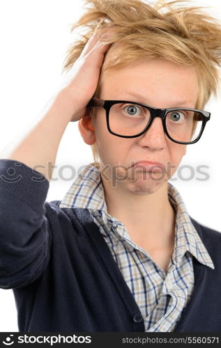 Frustrated teenage nerd boy in geek glasses against white background