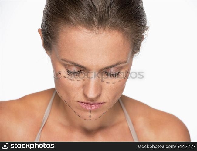 Frustrated woman with plastic surgery marks on face