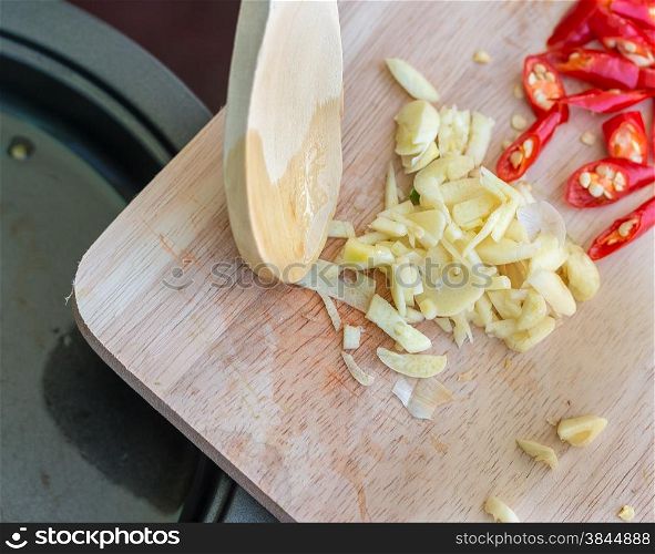 Frying Garlic Indicating Cook Book And Recipes