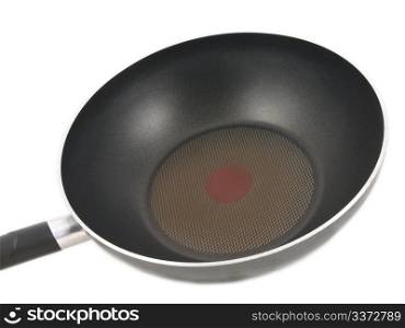 Frying pan. Frying pan with red hot spot isolated towards white background