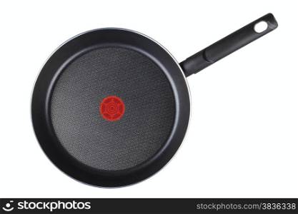 Frying pan with a teflon covering isolated on a white background