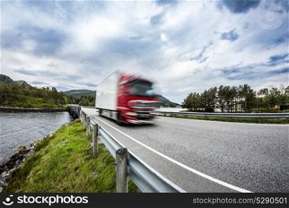 Fuel truck rushes down the highway, Norwey. Truck Car in motion blur.