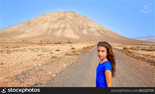 Fuerteventura girl in Tindaya mountain at Canary Islands of Spain