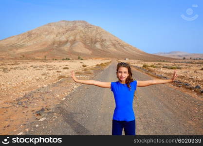 Fuerteventura girl in Tindaya mountain at Canary Islands of Spain