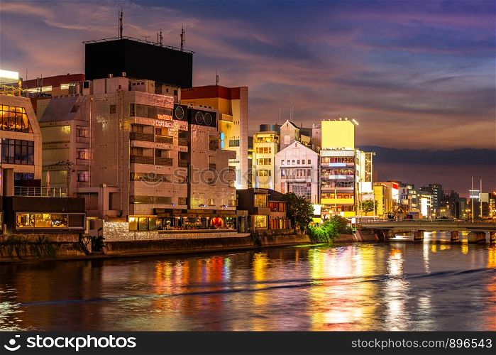 Fukuoka old town along naka river at Nakasukawabata sunset twilight. This area is favorite for tourist for Fukuoka Yatai, street Food stall, for hangout at night.