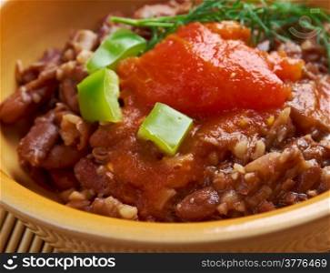 Ful medames - Egyptian,Sudanese dish of cooked and mashed fava beans served with vegetable oil,