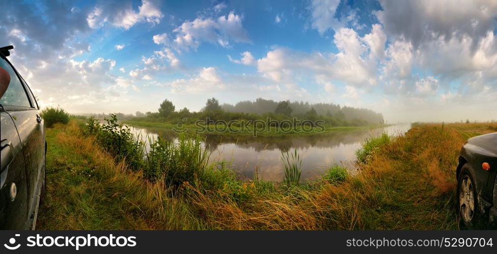 full 180 degree panorama beautiful of summer morning nature with grass and river. Summer misty morning river wide angle panorama. Car sides