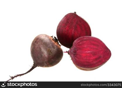 Full and two cross of beet-root. Isolated on white background. Close-up. Studio photography.