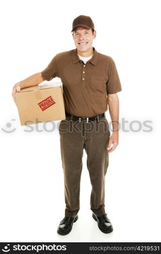 Full body isolated view of a handsome delivery man with a fragile package.