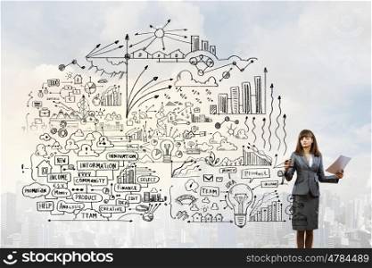Full body of businesswoman drawing sketches of business strategy. Businesswoman making presentation