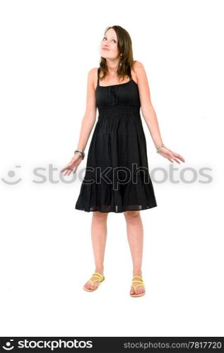 Full body portrait of a young brunette woman in a black summer dress, acting innocent and clueless
