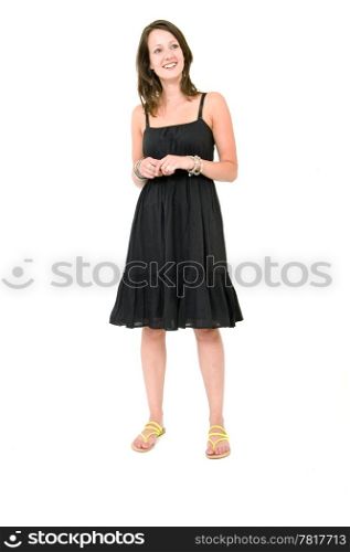 Full body portrait of a young brunette woman in a black summer dress, smiling, unforced