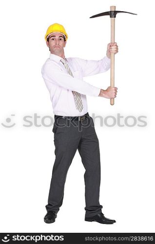 full-body portrait of architect holding pickaxe