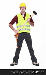 full-body portrait of carpenter holding hammer