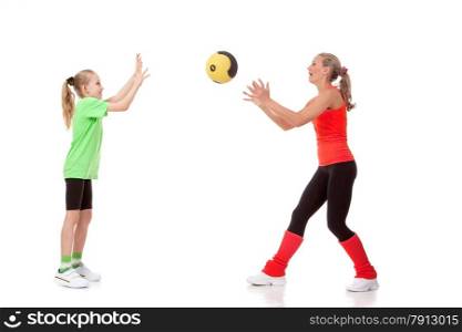 Full body shot of a little girl doing exercise with an instructor