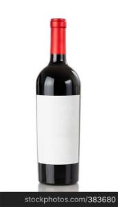 Full bottle of red wine isolated on a white background with reflection