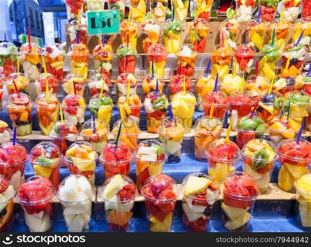 Full colors in this detail of fruit salads exposed in a Spanish market