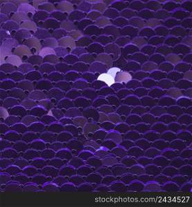 full frame abstract background purple reflective sequins