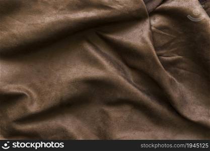 full frame shot brown drape background. High resolution photo. full frame shot brown drape background. High quality photo