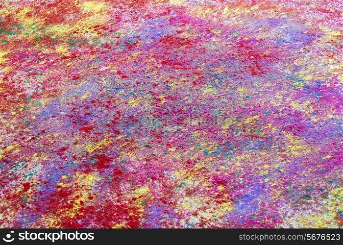 Full frame shot of colorful powder paint spread on floor