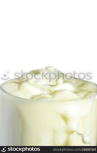 full glass of tasty milk and splashes