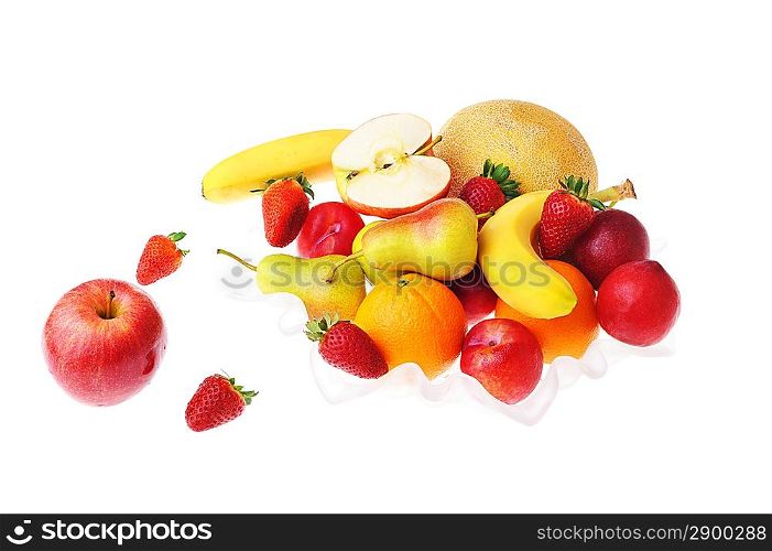 full glass vase of ripe tasty fruit and strawberries
