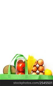 Full green bag of healthy food on a white background. Top view. fruit, vegetable, eggs online shop. your text. food delivery. Full green bag of healthy products food on a white background. Top view. online shop. your text. food delivery